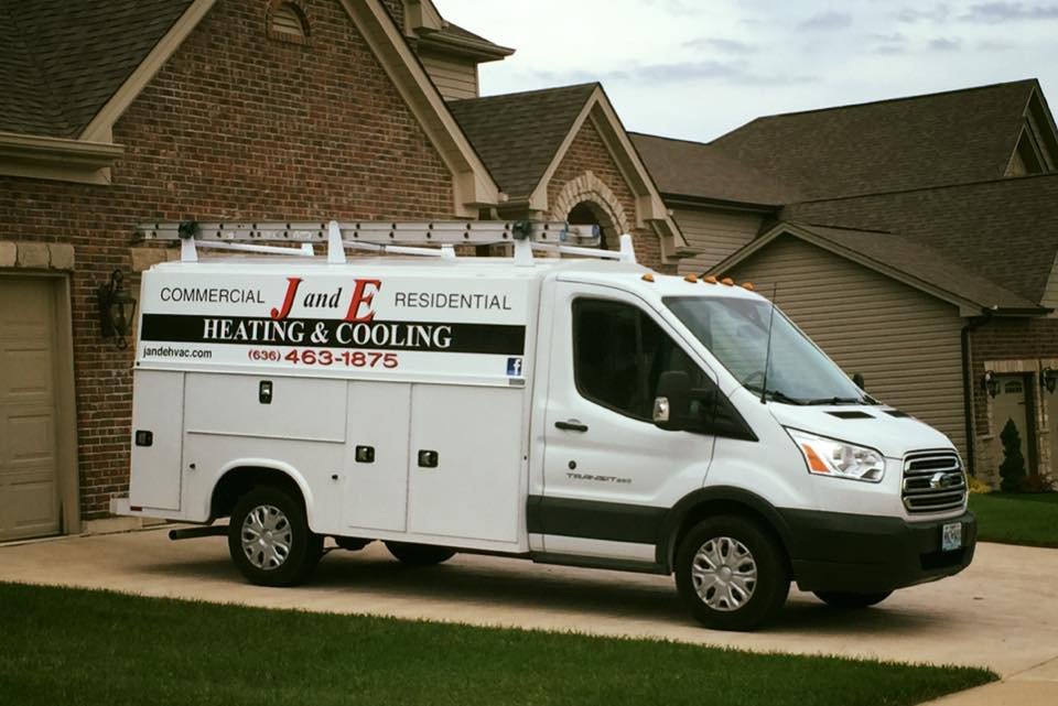J and E Heating & Cooling service truck